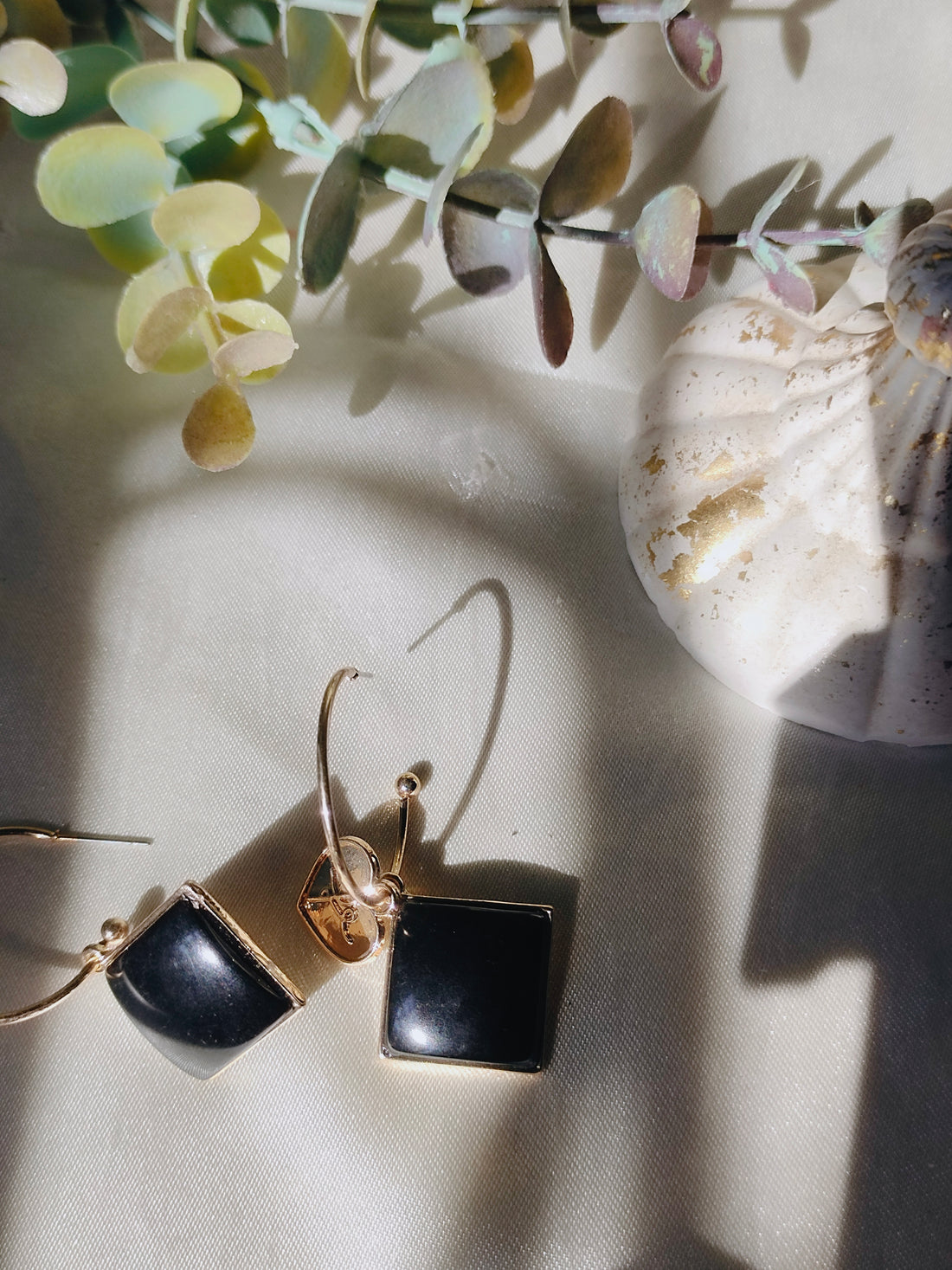 Black and gold earrings